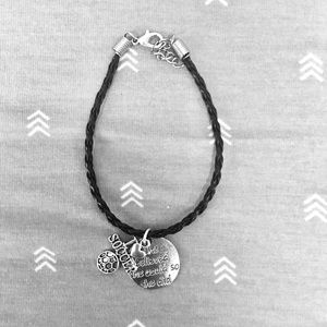 “She believed she could...” Bracelet